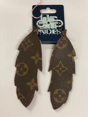 Large feather flourish earrings
